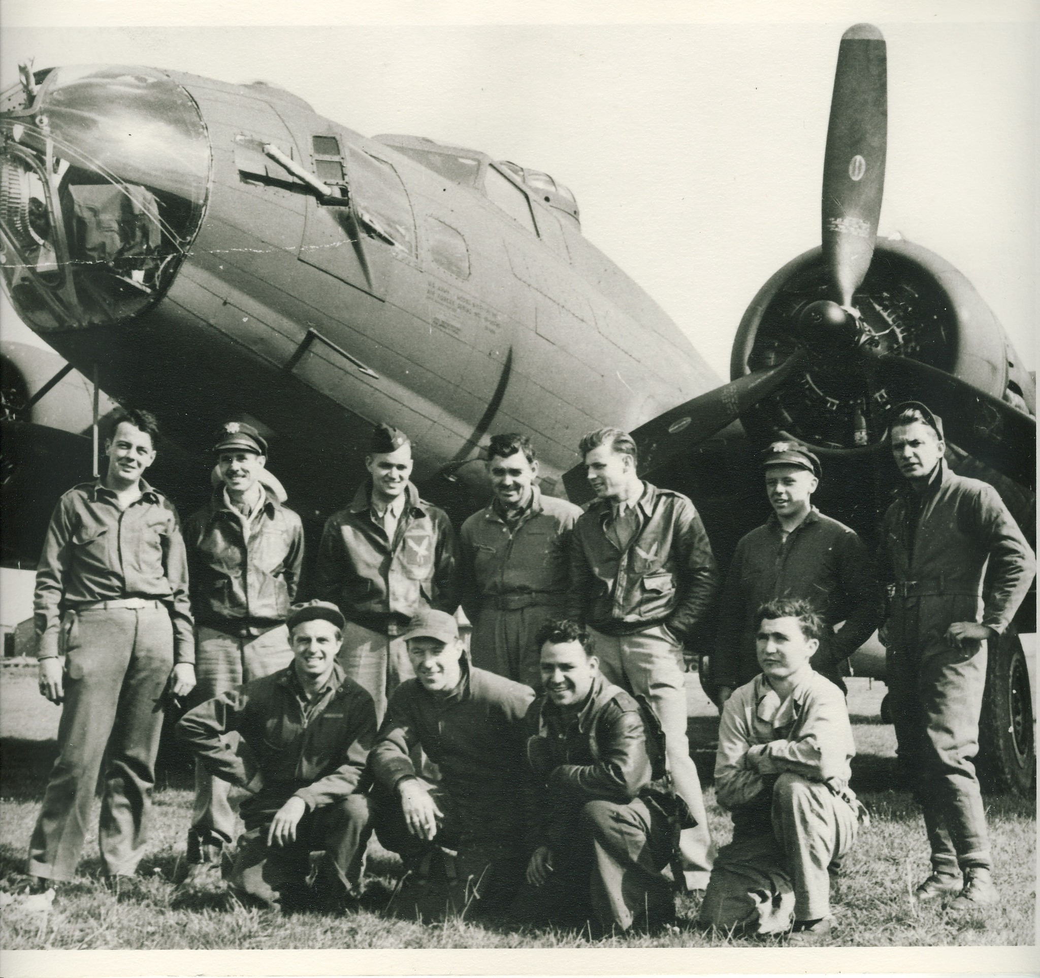 Formal crew portrait after Nantes mission, September 23, 1943 — Clark Gable, Lt Col Robert W. Burns, and crew in front of B-17F 42-30785