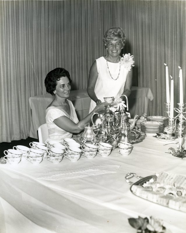 Ruth Burns, seated, as president of the Officers' Wives Club at Tyndall AFB in the early 1960s